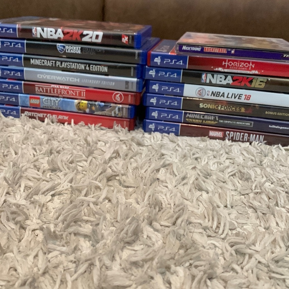 PS4 Game Bundle. Includes 15 PS4 games, 1 computer game & PS4 wired controller.